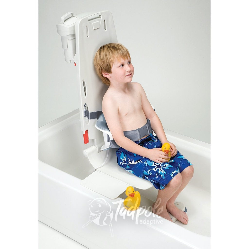 Child in tub sitting in the AquaLift Bath System with Lo Back Support.