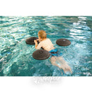 Top view of boy swimming independently in pool with the Pirat Floating Aid by Krabat.