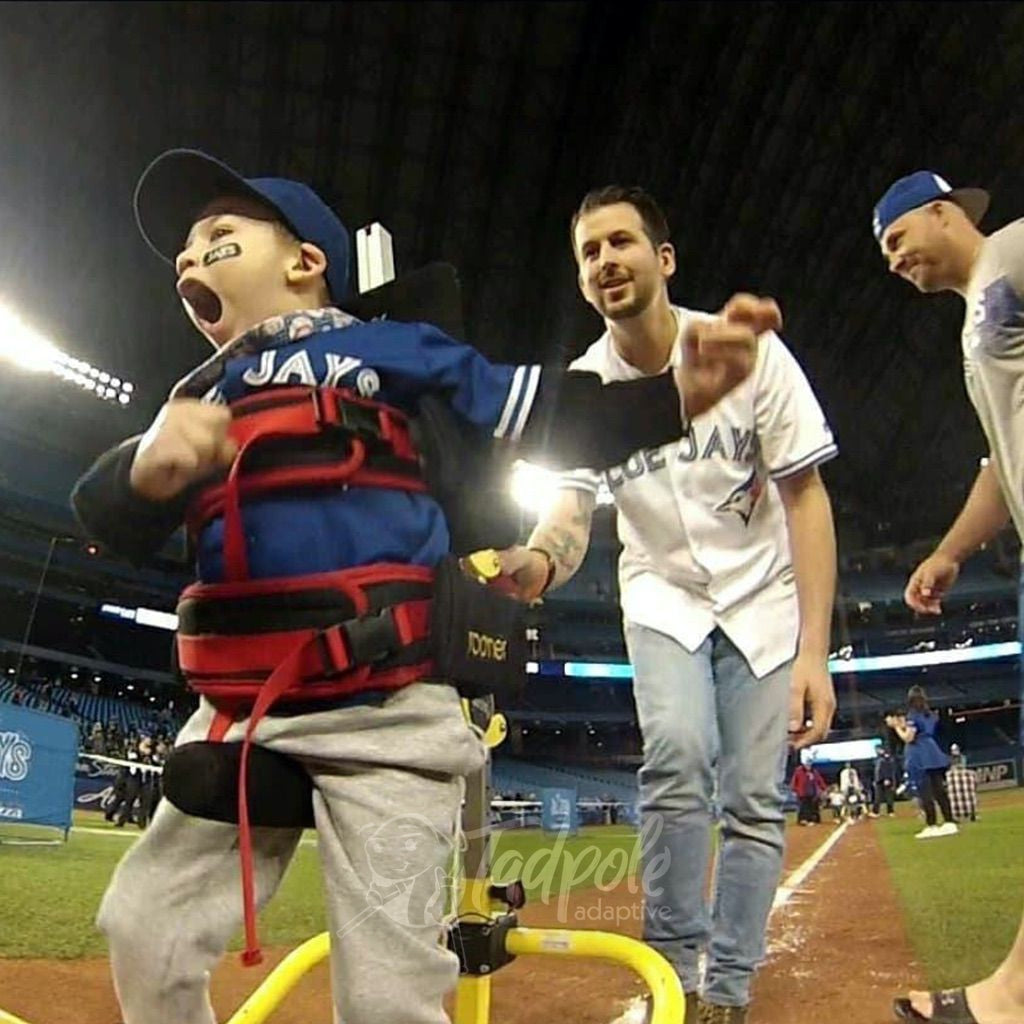 Buddy Roamer Anterior Gait Trainer Young boy palying baseball on field.