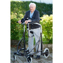 Older gentleman in his Pacific Rehab Meyland Smith Meywalk MK4 Gait Trainer, largest size.