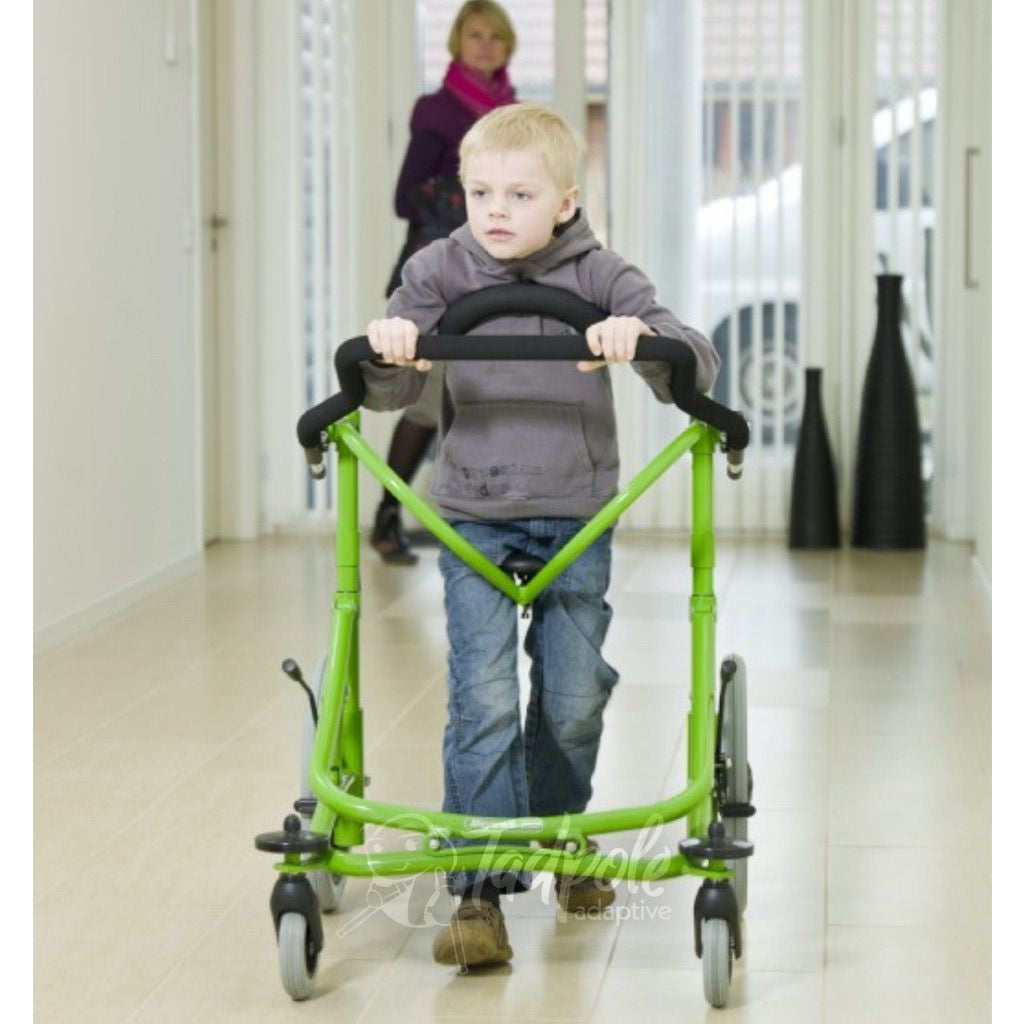 Meywalk Young boy with green Meywalk 2000 Gait Trainer By Pacific Rehab walking down hallway.