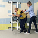 The Rifton Support Station pivot feature allowing assisted transfers to the toilet.