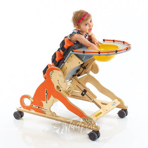 Little girl in her Jenx Monkey Prone Stander.