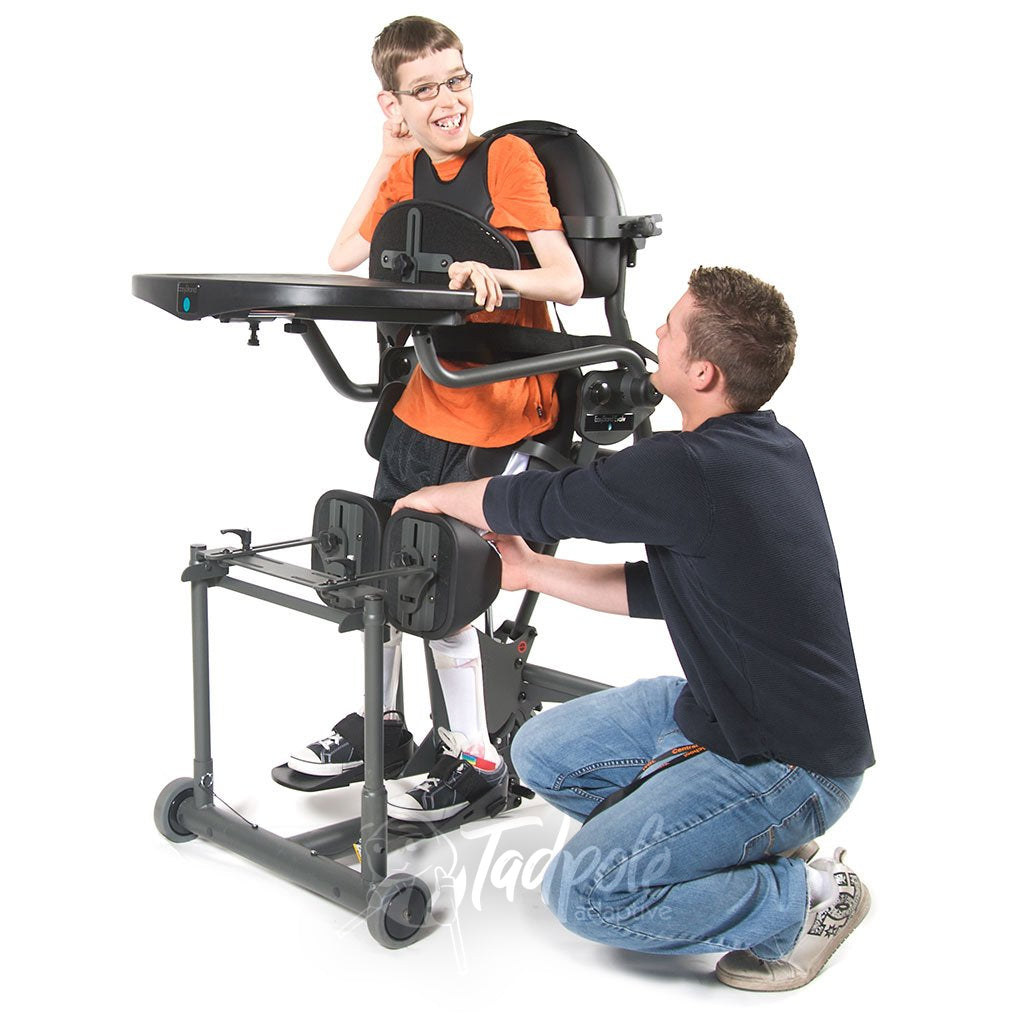 EasyStand Evolv E3 Medium, Boy standing with therapist helping