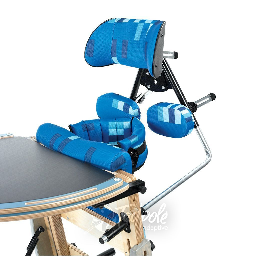 Leckey Freestander shown with headrest angle adjustments and tray.
