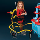 Young Girl in her Buddy Roamer Anterior Gait Trainer, with kitchen playset.