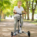 Young boy in park using his Krabat Runner kick bike.